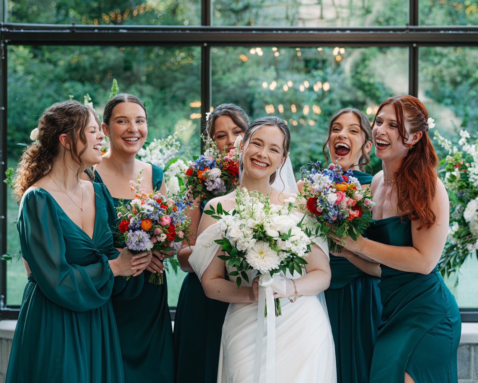 The bride celebrates with her bridesmaids